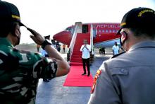 President Joko Widodo (white shirt) goes to S Sumatera from Halim Perdanakusuma Airbase, Jakarta on January 24, 2022. ANTARA/HO-Biro Pers Setpres/Laily Rachev/am.