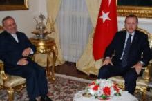 Mottaki discusses issues of mutual interest with Turkish PM