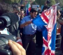 Students protest UK role in scientists assassination before embassy
