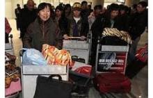 Third group of over 100 Thai workers return from Libya