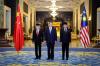 KUALA LUMPUR, April 16 -- His Majesty Sultan Ibrahim, the King of Malaysia (left), poses for a photo with Chinese President Xi Jinping during the state welcome at Istana Negara today, held in conjunction with the three-day State Visit that began yesterday.  Also present Prime Minister Datuk Seri Anwar Ibrahim.