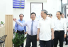 Party General Secretary To Lam (C) visits the Public Administrative Service Centre in Tan Vinh Loc commune, Ho Chi Minh City. (Photo: VNA)