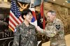 This undated photo, provided by U.S. forces stationed in South Korea, shows Brig. Gen. Moon Han-ok (L), deputy commanding general for South Korea at the Korea-U.S. Combined Division. (PHOTO NOT FOR SALE) (Yonhap)