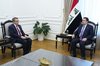 PM,  Mohammed Shia al-Sudani (right), Turkish Ambassador to Iraq Anil Bora İnan (left)