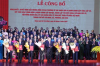 Party General Secretary To Lam (front, fifth from left) presents the resolutions and decisions on the merger of administrative units, the establishment of Party organisations, and the appointment of personnel at the ceremony in HCM City on June 30. (Photo: VNA)