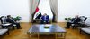 PM, Mohammed Shia Al-Sudani (center), the Special Representative of the United Nations Secretary-General for Iraq, Mohammed Al-Hassan (left)