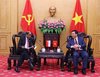 Nguyen Xuan Thang (right), Chairman of the Central Theory Council and President of the Ho Chi Minh National Academy of Politics. receives Singaporean Ambassador to Vietnam Jaya Ratnam on November 3. (Photo: VNA)