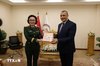 At the meeting between Deputy Chief of the General Department of Defence Industry Maj. Gen Phan Thi Hoai Van (left) and Egyptian Minister of State for Military Production Mohamed Salah El-Din Mostafa in Cairo. (Photo: VNA)